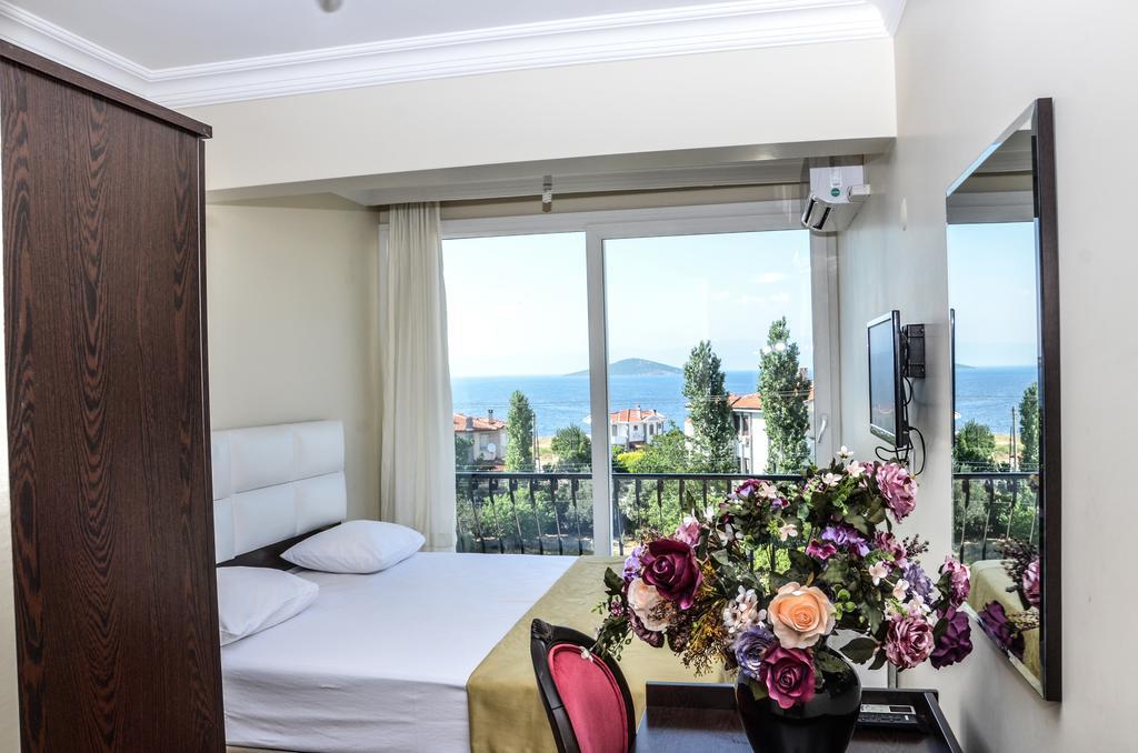 Uzunhan Hotel Аявали Стая снимка