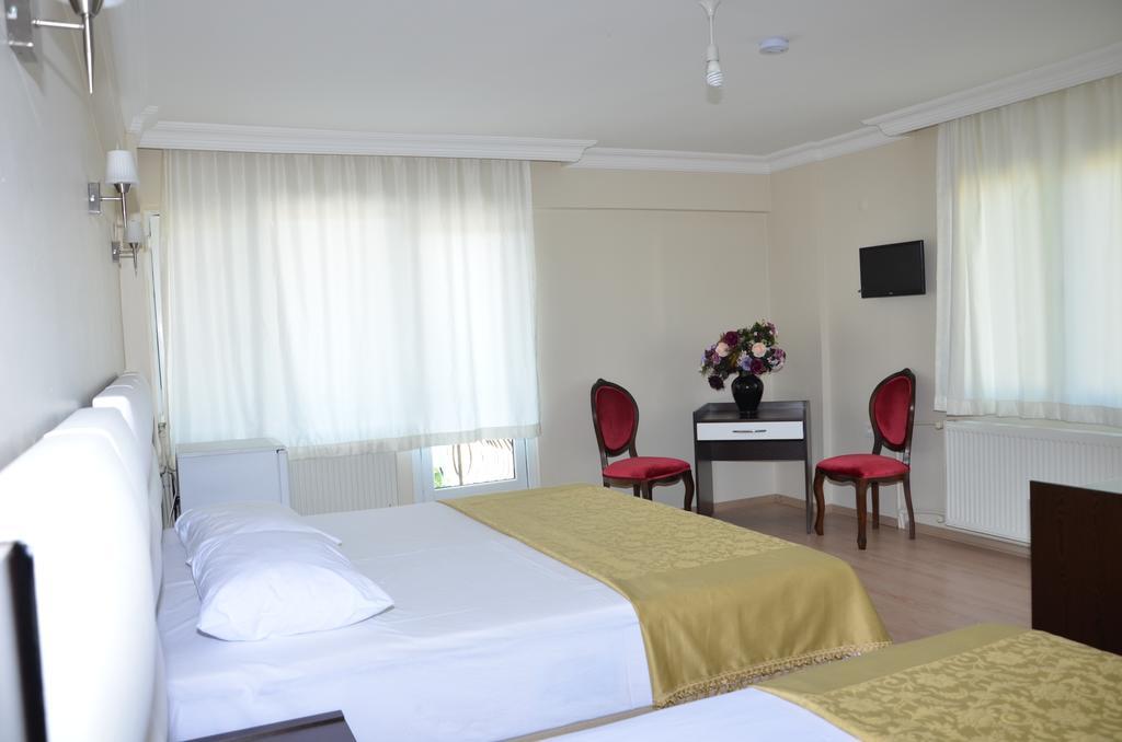 Uzunhan Hotel Аявали Стая снимка